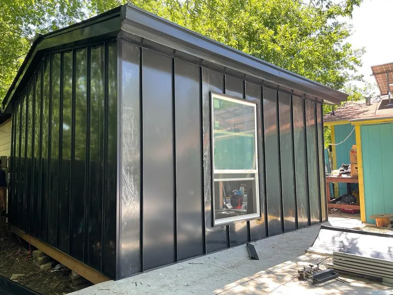 Black standing seam metal wall panels for Metal Roof Installation in North Brunswick