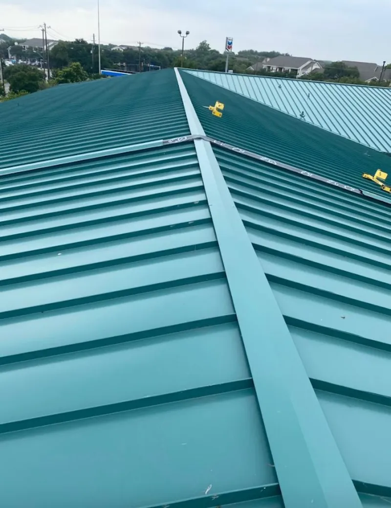 Green commercial metal roof ridge and valley for Metal Roof Repair in North Brunswick